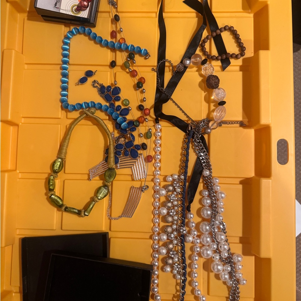 Bundle of pearl and bead necklaces